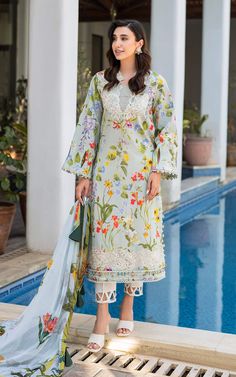 Brand: Asifa & NabeelProduct Code: MK-04 SuroorCollection: Meraki by Asifa & Nabeel Vol-02 Unstitched Luxury Lawn CollectionFabric: Lawn Details of Fabric: Digital printed shirt (front, back, sleeves) 2.1 meters (50” width). Embroidered neckline for front on organza. Embroidered daman border for front on organza. Digital printed dupatta on chiffon. Plain dyed cambric trouser 2.25 meters. DISCLAIMER: Lining, Laces, and Tassels are not included in unstitched variants. Embellishment items in stitched outfits are subject to market availability The actual colors of the outfit may vary from the colors being displayed on your device. CARE INSTRUCTIONS: Extra Fabric Has Been Used For Shoot Original Color May Vary Slightly From The Picture Dry Clean Recommended Iron The Clothes At Moderate Temperat Luxury Multicolor Printed Motifs Lawn Suit, Luxury Lawn Suit With Dupatta In Shantoon, Luxury Formal Lawn Suit With Printed Motifs, Luxury Formal Lawn Suit With Self Design, Luxury Multicolor Lawn Suit With Printed Motifs, Luxury Digital Print Dupatta For Summer, Luxury Semi-stitched Floral Lawn Suit, Luxury Lawn Suit With Printed Motifs, Luxury Lawn Suit Saree With Self Design