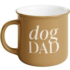 a coffee mug with the words dog dad printed on it