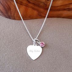 Big Sister Necklace, Engraved Heart Necklace with Birthstone 925 Sterling Silver, Personalised Jewellery, Gift for Big Sister, Sister Gift Material: 925 Sterling Silver  Chain Size: 14", 16" & 18" Chain Type: Fine Trace Chain & Medium Curb Chain Heart Size: 13mm x 14mm Birthstone Size: approx. 4mm excluding jump ring Packaged in a Luxury Gift Box PRODUCT DETAILS This beautiful necklace Includes a sterling silver heart pendant which can be engraved with wording of your choice. This sterling silver personalised necklace looks stunning combined with a pretty birthstone. For a special gift you could add the birthstone in the birth month colour of your choice. Includes a diamond cut trace chain or curb chain. The diamond cut finish gives an added shine to the necklace, which is made in Italy. O Birth Month Colors, Big Sister Necklace, Engraved Heart Necklace, Big Sister Gifts, Chain Heart, Sister Sister, Sister Necklace, Personalised Jewellery, Sterling Silver Heart Pendant