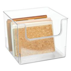 a clear acrylic box with cork inside