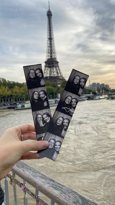 someone is holding up some photos in front of the eiffel tower, paris