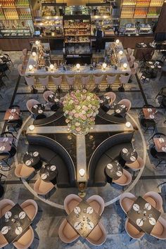 an overhead view of a restaurant with tables, chairs and chandeliers in the center