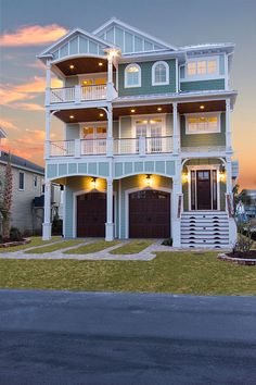 a large two story house with multiple balconies