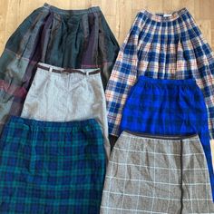 "This is a mixed lot of SIX vintage women's skirts from the 1990s or earlier. The skirts are all different sizes and colours and most are made in the USA and Canada. They all have an all over print design of mostly plaid and are mostly made from 100% wool. The skirts are from companies such as Linda Alland, Pendleton and Chadwick's Classics. All the skirts within the order are included in the photos above. Brand, Actual Waist Band Measurement (Tag Size), Made in USA? -Linda Alland for Ellen Tracy, 28\" (10), Made in USA by ILGWU -Pendleton, 24\" (6), Made in USA -College Town, 27\" (11/12), Made in Canada -Pendleton, 24\" (6), Made in USA -Pendleton, 38\" (N/A), Made in USA -Chadwick's Classics, 32\" (14P) Overall, the skirts are in good shape and can be sold immediately. Some may have a s Skirts Vintage, Retro Mode, Ellen Tracy, Women's Skirts, Wool Skirts, Ladies Fashion, Vintage Skirt, Waist Band, High Waisted Skirt