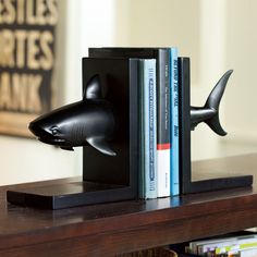 a bookend that has a shark head on it