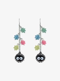 the earrings are decorated with colorful stars and an evil face on each earring chain