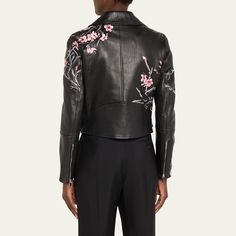 Alexander McQueen grainy lambskin leather moto jacket with blossom embroidery Wide notched collar; asymmetric zip front Long sleeves; zipper vents  Front zip pockets  Buckled waist belt Fitted silhouette  Made in Italy Blossom Embroidery, Cocktail Jacket, Embroidered Leather, Leather Moto, Leather Moto Jacket, Fitted Silhouette, Notched Collar, Lingerie Sleepwear, Moto Jacket