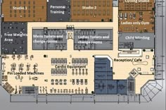 the floor plan for an office building with several tables, chairs and other equipment in it