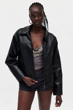 Faux leather BDG jacket with a lived-in look. This sleek faux leather jacket hits at the waist in a relaxed fit with a pointed collar and a zip closure at the front. Finished with a mini BDG logo motif at the hem. Urban Outfitters exclusive. Features BDG faux leather car jacket Oversized faux leather jacket Shirt collar jacket with oversized sleeves Zip-up front bodice with side pockets Relaxed, oversized fit Regular length Zip closure UO exclusive Content + Care 92% Polyester, 5% cotton, 3% vis Car Jacket, Oversized Sleeves, Jacket Shirt, Estilo Chic, Solid Color Dress, Collar Jacket, Style Chic, Faux Leather Jackets, Shirt Collar