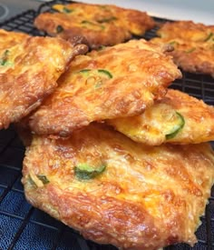 some fried food is cooling on a rack