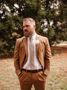 Tan Suit Western Wedding, Tan And Brown Suit Wedding, Caramel Groomsmen Suits, Dark Tan Suit, Brown Suit Men Wedding, Groom Brown Suit, Brown Notch Lapel Sets For Grooms, Boho Wedding Suit Grooms Brown, Mens Groom Suit