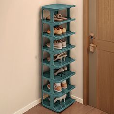 there is a blue shoe rack in the corner