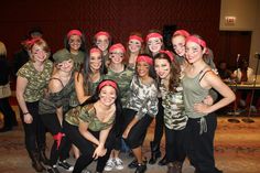 a group of young women posing for a photo