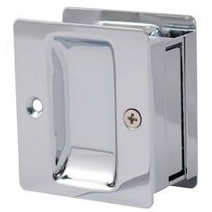 an image of a stainless steel toilet paper dispenser with the door open