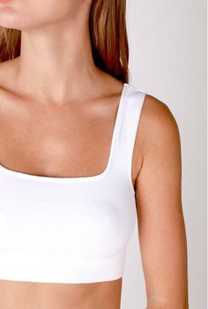 Feel comfy and adorbs in the NIKIBIKI White Cropped Ribbed Tank! Made of stretchy ribbed knit, this cropped tank has a square neckline, wide straps, a fitted sleeveless bodice, and a cropped hem. Perfect with high-waisted leggings or your fave ripped shorts! DETAILS & FIT Fitted. 92% Nylon, 8% Spandex. Machine Wash Cold. Made in the USA. One size fits XS-XL. Statement Crop Top, Tiny Crop Top, Custom Crop Top, Hoodie Customize, Tailgate Outfit, Maxi Jumpsuit, Color Text, Silk Bottoms, Ripped Shorts