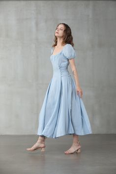 "Linennaive's versatile pieces work for a variety of occasions in effortless shapes and timeless designs. This seafoam-blue girdle dress is cut from a linen and silk-blend and has ruffled neckline and puff sleeve silk sleeves to enhance the breezy, easy-going silhouette. Whether you're going for a casual or classic look, this blue linen midi dress from Linennaive will match perfectly in either way. No doubt. 【Fabric】 Main100% linen, natural pure linen. Medium weight. It is washed with special te Pale Blue Dress Casual, Wrinkle Dress Outfit, Casual Light Blue Dress, Vintage Puff Sleeve Dress, Blue Linen Midi Dress, Blue Dress Puff Sleeves, Linennaive Dress, Light Blue Dress Casual, Blue Cottagecore Dress