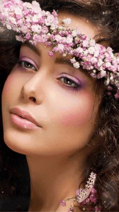 a woman with flowers in her hair