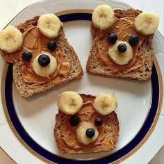 toast with bananas and blueberries in the shape of bears on them, next to pictures of sliced banana slices