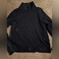 Nwot Under Armour Cowl Pullover. Metallic Black Color- Be Great To Dress Up Or Down. Medium Black Sporty Funnel Neck Tops, Black Sporty Top With Funnel Neck, Sporty Black Funnel Neck Top, Sporty Black Top With Funnel Neck, Sporty Black Turtleneck Top, Black Stretch Sweatshirt With Funnel Neck, Black Funnel Neck Sweatshirt For Layering, Black Funnel Neck Top For Streetwear, Black Funnel Neck Sweatshirt For Fall