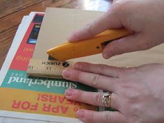 a person is using a ruler to measure something