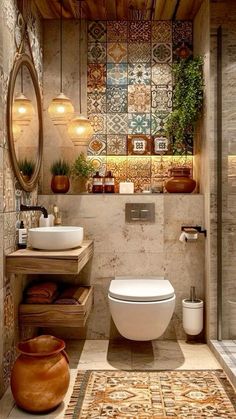 a bathroom with a toilet, sink and mirror in it's center wall area