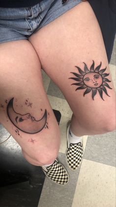 two sun and moon tattoos on both legs