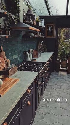 a kitchen with an oven, sink and counter top