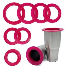 the cups are next to each other with pink rings around them