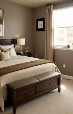 a bedroom with a large bed, mirror and bench in the corner next to it