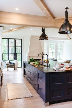 the kitchen is clean and ready to be used as a dining room or family room