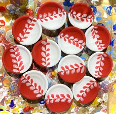 cupcakes decorated with red and white frosting