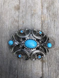 Beautiful metal belt buckles that fit a 1.5” belt strap. Three styles:Turquoise stone - 4” x 3” outer dimensionsScalloped with green diamond - 3.5”x2.75”Celtic knot - 3.5” x 2.1” Blue Concho Western Belt Buckles, Western Style Blue Concho Belt Buckles, Adjustable Turquoise Western Belt Buckles, Western Buckles, Western Belt Buckles, Metal Belt, Green Diamond, Bubblegum Pink, Celtic Knot