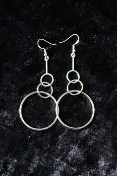 "Simple, modern and pretty lightweight for their size, these earrings will still make a statement and create a lot of movement around your face. You'll get to select your preferred ear wire type and a style variation. I offer sterling silver and non-precocious metal ear wires, which is reflected in the price. The last photo will help you figure out the type you want.  The style variation is very subtle. Pick the mirror polished \"smooth\" option if you are an elegant minimalist, or the \"texture Trendy Sterling Silver Jewelry With Simple Design, Modern Hypoallergenic Sterling Silver Jewelry, Minimalist Metal Earrings For Party, Minimalist Metal Linear Earrings, Trendy Silver Circular Jewelry, Trendy Silver Circle Jewelry, Modern Silver Hypoallergenic Linear Earrings, Modern Silver Hoop Earrings For Party, Modern Hypoallergenic Silver Linear Earrings