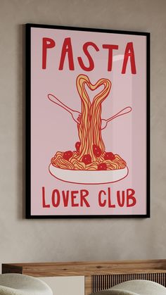 a poster hanging on the wall above a bed that reads pasta lover's club