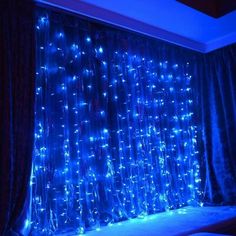 the curtains are covered with blue lights