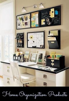 a desk with some pictures on the wall