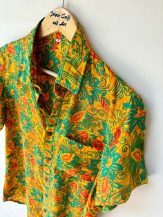 90s Vintage Men's Silk Shirt / Men's Hawaiian Shirt / Silk Shirt / Chic Shirt For Men / Gifts For Him / Shirt For Him / Holidays Shirt JAIPUR CRAFT AND ART Presenting Indian Vintage Silk Shirts For Men And Women . Limited Edition Shirt. Fabric on a limited Prints And Edition, The Men / He will feel so unique! Beautiful Shirt in Silk, Button Up and Short sleeves.   Perfect Gifts For Him / Gifts For Father / Gifts For Boyfriend / Gifts For Brother  Your Men / He will feel amazed by the quality and Green Tops With Vintage Print For Summer, Green Top With Vintage Print For Summer, Green Vintage Print Short Sleeve Top, Green Vintage Print Tops For Summer, Relaxed Fit Long Sleeve Hawaiian Tops, Hawaiian Long Sleeve Relaxed Fit Tops, Hawaiian Style Long Sleeve Relaxed Fit Tops, Orange Cotton Top With Camp Collar, Relaxed Fit Long Sleeve Hawaiian Shirt