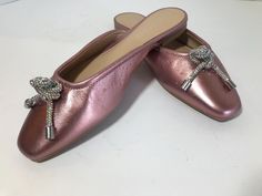 Copper Key pink metallic slip on leather mules,  shoes, Size 7M, Copper Key muted pink metallic slip on flats with aroura borealis rhinestone detail. Elegant Pink Slip-on Flats, Pink Leather Slip-on Mules, Pink Slip-on Flats With Pointed Toe, Pink Leather Slip-on Flats, Leather Flat Slip-ons For Party, Pink Leather Flats For Evening, Pink Party Slippers For Spring, Pink Slip-on Flats With Flat Heel, Pink Slip-on Mules For Evening