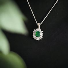 "EMERALD BAGUETTE NECKLACE: A Thoughtful Christmas Gift for Her Are you searching for the perfect Christmas gift that conveys your deep appreciation for your best friend? Look no further! Our \"Emerald Baguette Necklace\" is a heartfelt choice that symbolizes your unique bond. EXQUISITE CRAFTSMANSHIP AND DESIGN Crafted from high-quality 925 sterling silver and adorned with sparkling diamond cz, this necklace is a true standout. The baguette-cut emerald cz, a symbol of love and inspiration, takes center stage in a delicate and minimalist design. PRODUCT DETAILS * Chain Length: 16-18 inches * Chain Style: Cable * Adjustable Length: Yes * Material: 925 Sterling Silver * Gemstone: Diamond cz, baguette-cut emerald cz * Average Weight: 3.9 grams * Dimensions: 0.5 by 0.6 inches * Style: Minimalis Gift Gemstone Necklace With Baguette Cut, Baguette Cut Gemstone Necklace As Gift, Baguette Cut Gemstone Necklace For Gift, Baguette Cut Emerald Necklace Gift, Fine Jewelry Baguette Diamond Necklace Gift, Gift Fine Jewelry Emerald Necklace With Baguette Diamonds, Silver Emerald Jewelry With Baguette Diamonds, Emerald Baguette Cut Necklace For Gift, Emerald Cut Baguette Diamond Necklaces For Gifts