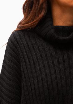 Crafted from a luxurious cashmere wool blend, this sweater from Mr. Mittens offers a sumptuous feel against your skin. The oversized silhouette and split sides create a relaxed and contemporary look. With a high neck that's both distinctive and cozy, this sweater provides the ultimate in warmth and style. The ribbed texture adds depth and sophistication, while the length below the hips ensures a flattering fit. Cashmere Wool Hand Wash or Dry Clean Model is 5’8” and wearing a size XS/S. Runs true Mr Mittens, Turtle Neck Dress, Oversized Silhouette, Cashmere Wool, Black Midi Dress, The Row, Wool Blend, The Dress, High Neck