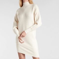 Express Sweater Dress Asymmetrical Hem Midi Length Warm Turtleneck And Long Dolman Sleeves Beautiful Cream Color Size S Nwt *Please Note A Small Pull In The Fabric As Shown In Last Photo Cream Knit Mini Length Sweater Dress, Cream Fitted V-neck Sweater Dress, Express Sweater Dress, Chic Stretch V-neck Sweater Dress, Beige Knitted V-neck Sweater Dress, Beige Stretch V-neck Sweater Dress, Dress Asymmetrical, Express Dresses, Asymmetrical Hem