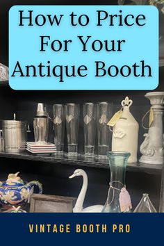 an antique booth with glassware and other items on it, including vases and bottles