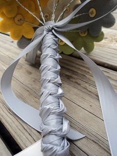 a close up of a ribbon on a wooden table