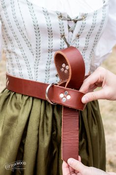 A good belt will elevate any costume, and this one is top of it's class. Hand crafted from the highest quality English bridle leather. Thick, durable, and built to last. It will start out a bit stiff, but quickly breaks in and learns your body without stretching out and compromising it's strength. All ring belts are UNISEX and come 60-65 inches long, but can be shortened. Let us know if you'd like a specific length in the "Order special instructions" section in your cart. If customized and cut, English Bridle, Ring Belt, Studded Belt, Eyeglass Case, Hair Barrettes, Pouch Bag, Purse Wallet, Stretching, New Product