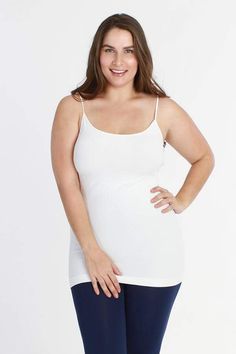 Super Stretchy 28-30" long Fits up to 50" bust 1.25 inch Strap Opaque nylon/spandex for full coverage Provides Smoothing and Control 92% Nylon8% Spandex Great Plain Jersey Tank to Wear Alone or Layer Made in the USA! Low Cut Shirt, White Spaghetti, Casual Menswear, Cheap Wedding Venues, White Spaghetti Strap, Plus Size Brands, Womens Cami, Wedding Dresses Plus Size, Lovely Clothes