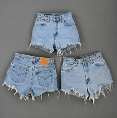 Cotton Jeans With Frayed Hem And Short Legs, Cotton Jeans With Frayed Hem And Short Leg, Short Leg Cotton Jeans With Frayed Hem, Ripped Short Leg Cotton Jeans, Ripped Short Leg Jeans, Faded Cutoff Bottoms With Frayed Hem, Vintage Ripped Bottoms For Summer, Vintage Jeans With Frayed Hem For Summer, Vintage Frayed Hem Jeans For Summer