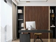 a desk with a computer on top of it in front of a bookshelf