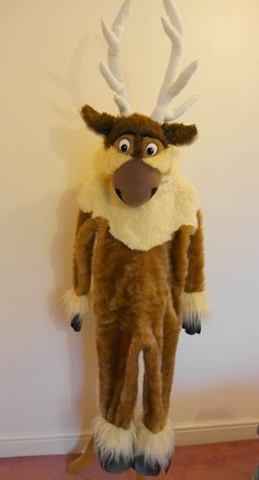 a stuffed animal with antlers on it's head