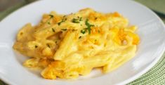 a white plate topped with macaroni and cheese