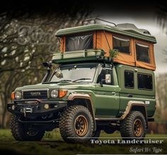 the toyota landcruiser is an off - road vehicle with a roof tent